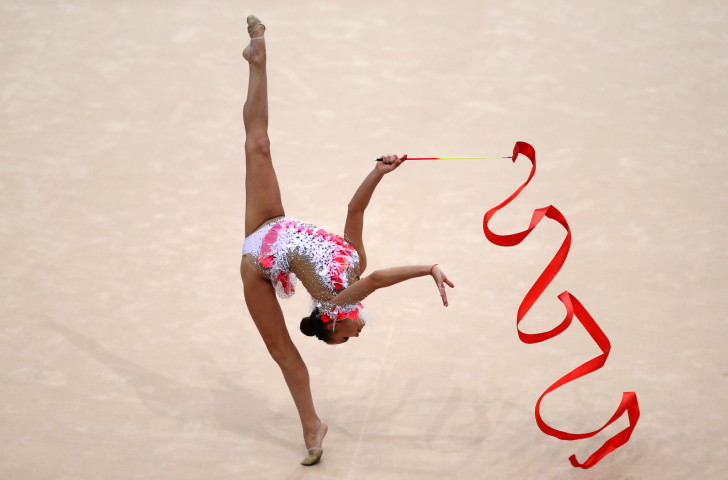 Defending all-around champion Dina Averina won the individual ribbon and clubs events today at the Rhythmic Gymnastics World Championships in Baku as Russia took the team title ©Getty Images