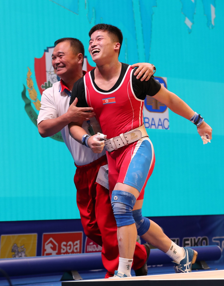 Rounding off the total podium was North Korea's Pak Jong Ju, who broke the world record in the clean and jerk with a lift of 188kg to finish on 330kg overall ©IWF
