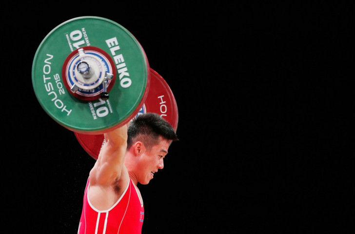 North Korea's Un Guk Kim won the men's 62kg snatch but had to settle for second place in the overall standings ©Getty Images