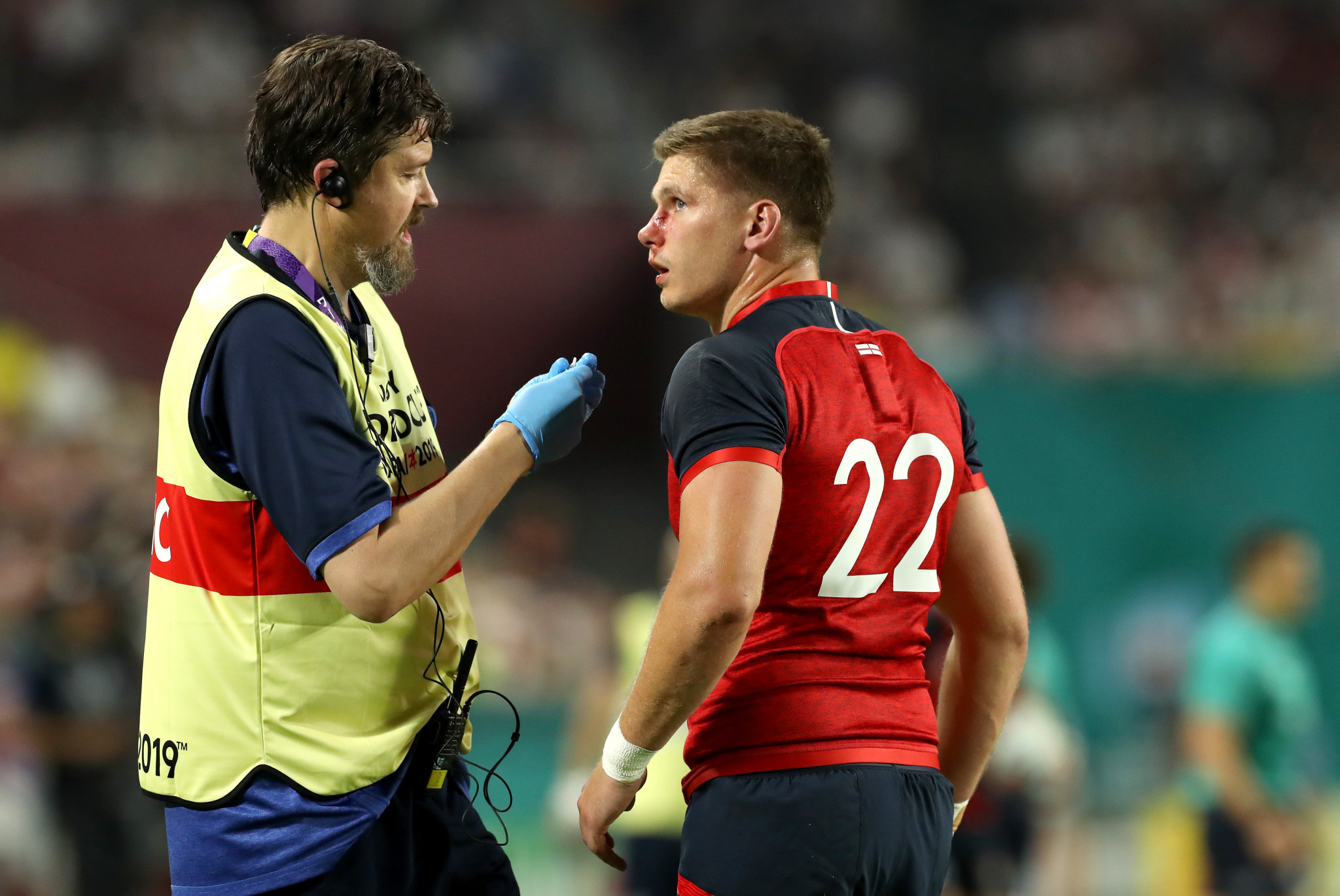 England's Owen Farrell receives treatment after John Quill's head-high challenge that led to a red card ©Getty Images
