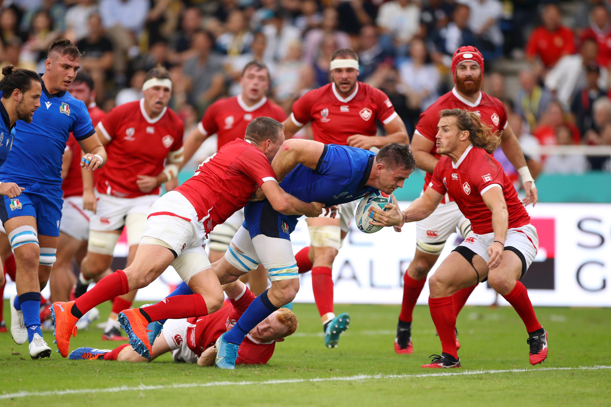 Braam Steyn gets the scoring underway for Italy against Canada ©Getty Images