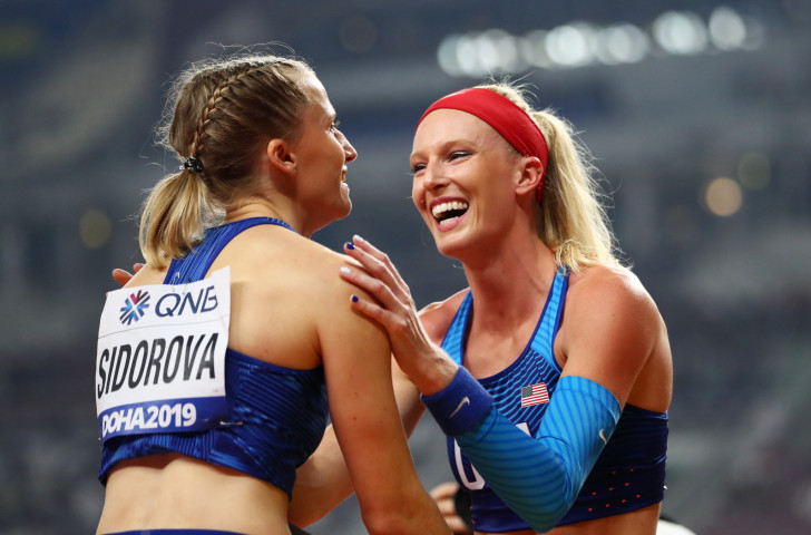 Anzhelika Sidorova is congratulated by silver medallist Sandi Morris of the United States after a dramatic win in the pole vault with a clearance of 4.95m ©Getty Images
