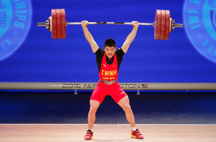 China's Zhiyong Shi claimed the men's 69kg clean and jerk and overall titles