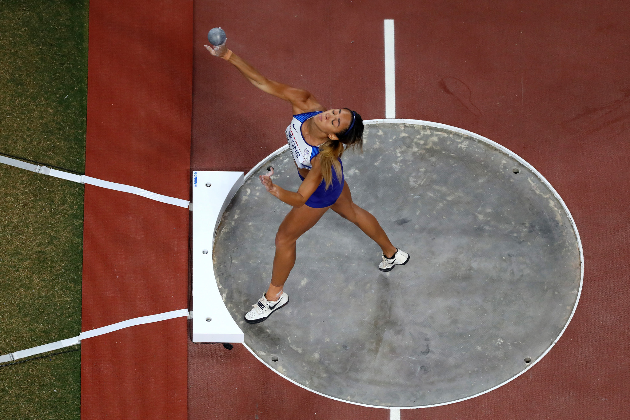 Katarina Johnson-Thompson of Great Britain competes in the women's heptathlon shot put as she finished the opening day in the lead ©Getty Images