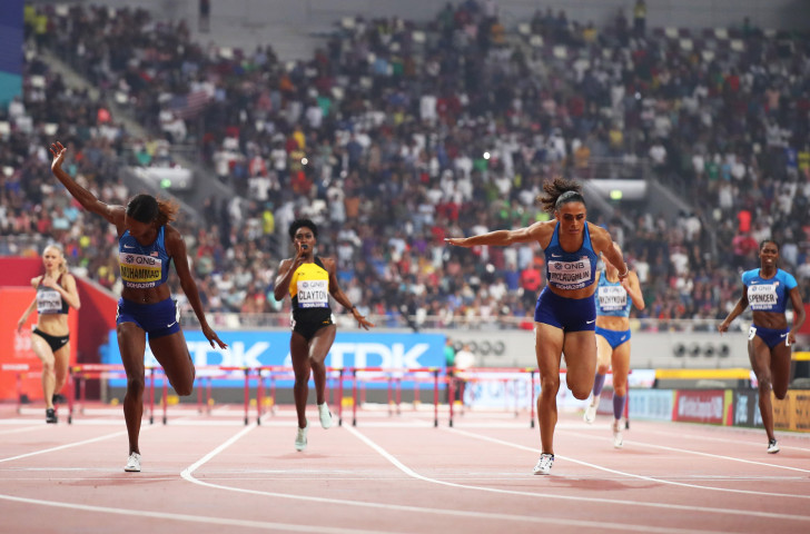Dalilah Muhammad, left, lowers her world 400m hurdles record under pressure from US rival Sydney McLaughlin ©Getty Images