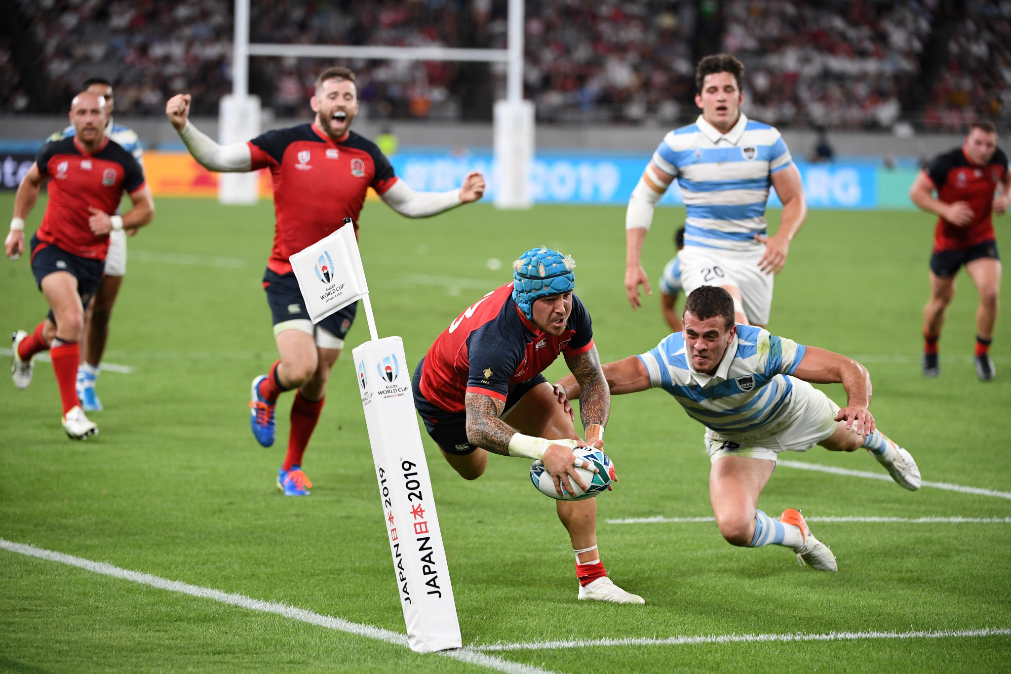 England scrap to Argentina win, while Japan dare to dream