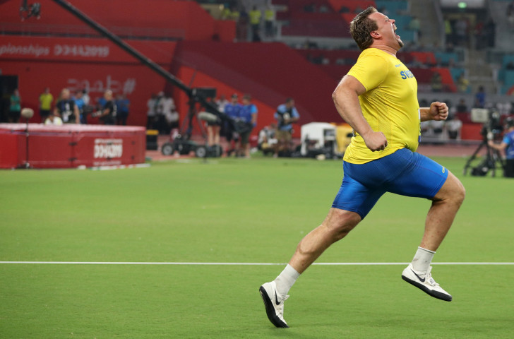 Sweden's Daniel Stahl turns sprinter in celebration of his world discus gold in Doha ©Getty Images