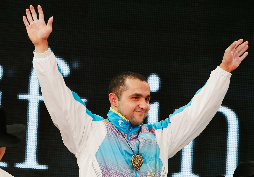 Kazak capitalises on Olympic champion's collapse to claim double gold at 2015 World Weightlifting Championships