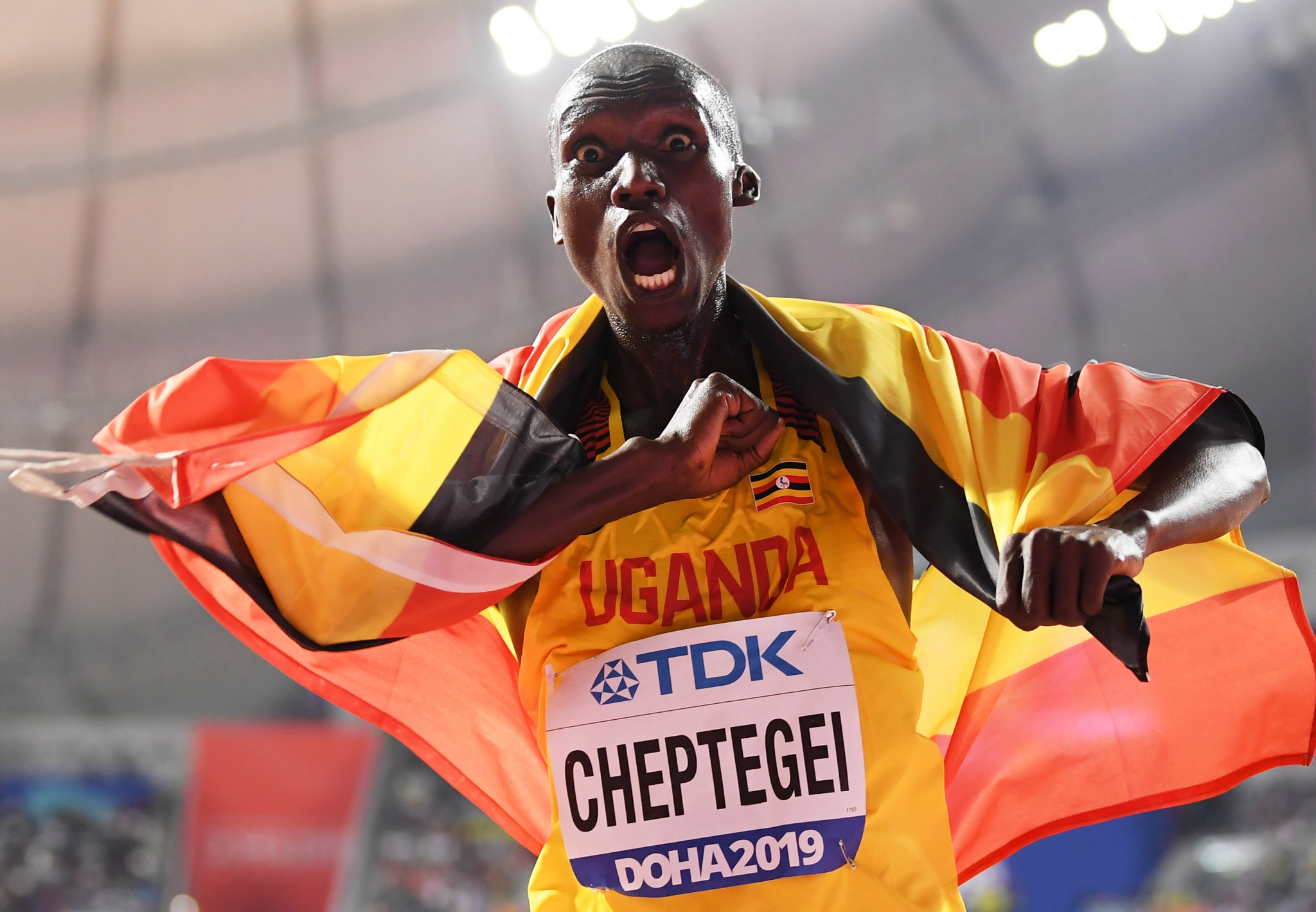 Uganda's Joshua Cheptegei cannot hide his joy after winning the gold medal in the men's 10,000m ©Getty Images