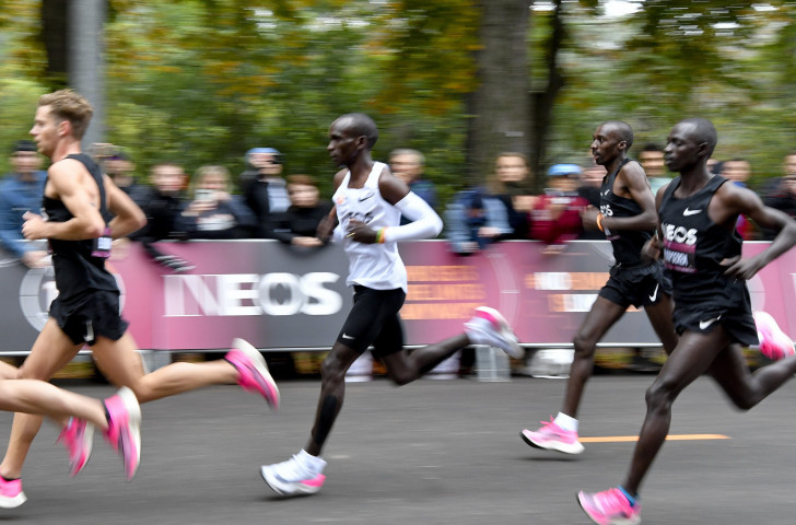 Eliud Kpchoge was helped to his target in Vienna today by 35 pacers running in shifts of seven every three kilometres ©Getty Images