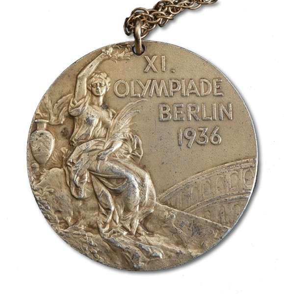 Carl Shy's basketball gold medal from Berlin 1936 comes with a letter of Authenticity from the Shy Family