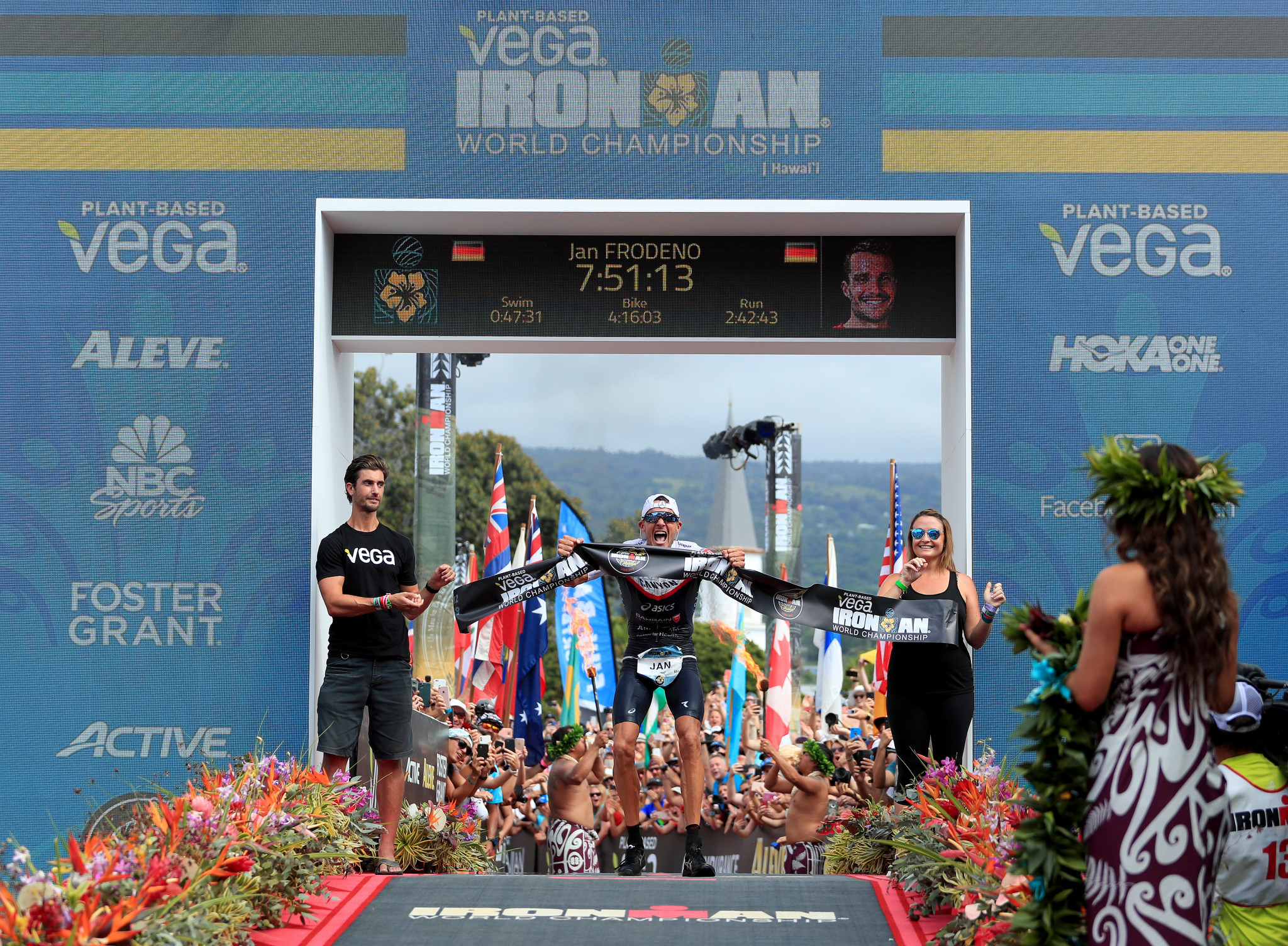 Frodeno regains Ironman world title with course record as German compatriot Haug wins first women's gold