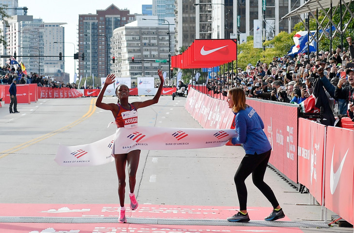 Kenya's Brigid Kosgei breaks the 16-year-old world record for the women's marathon in Chicago, clocking 2 hour 14min 04sec = a performance that race director Carey Pinkowski believes may have been inspired by Kipchoge ©Getty Images