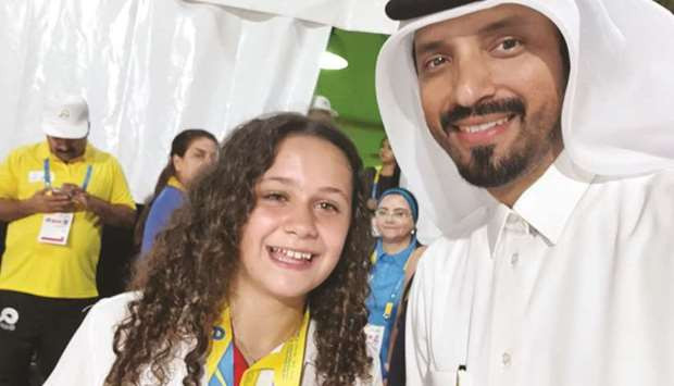 Farhan Al Sayed, the founder of Qatar Extreme Sports, poses with Spain's ANOC World Beach Games skateboard park bronze medallist Julia Benedetti ©Twitter
