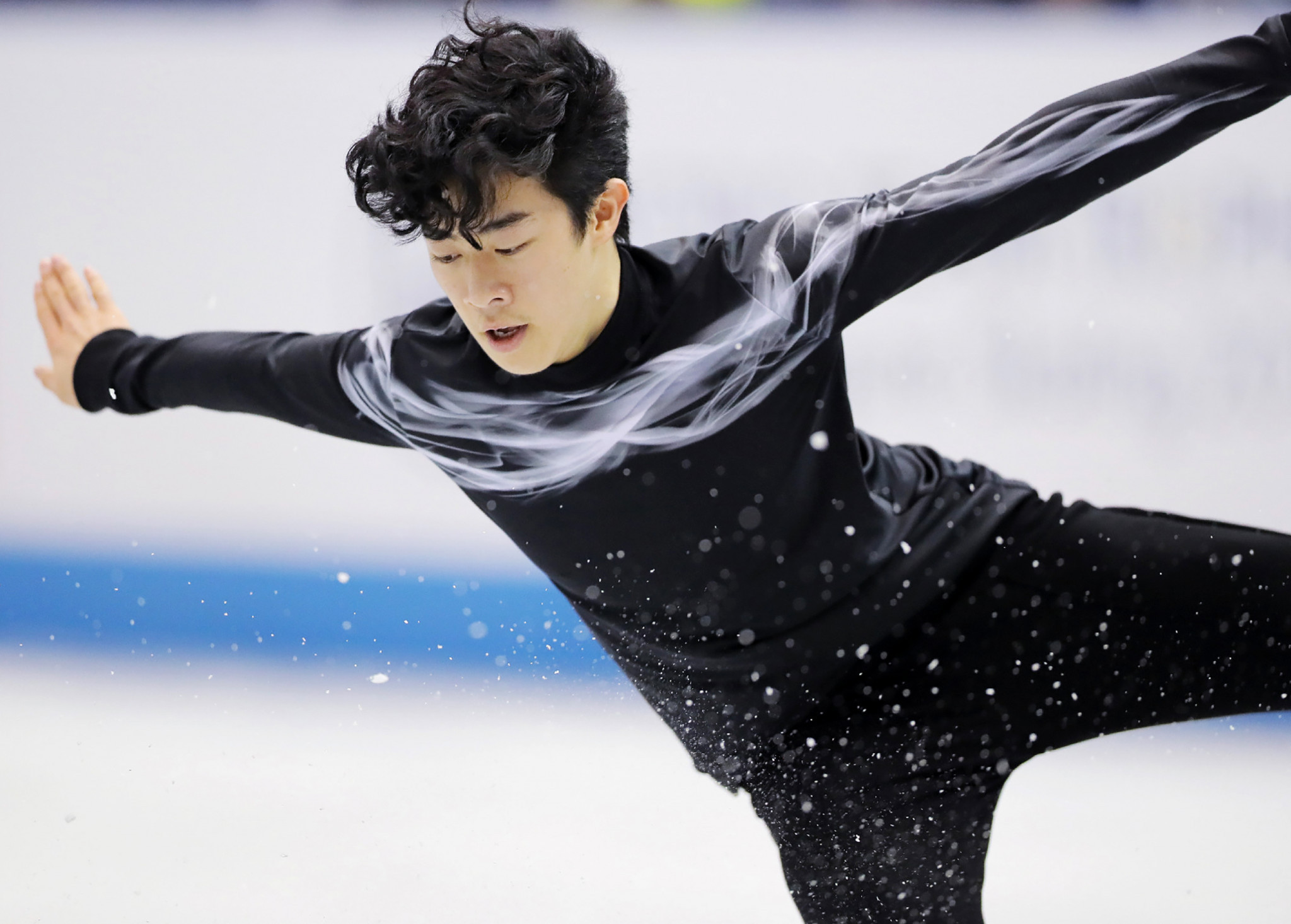Chen leads men's competition at Skate America