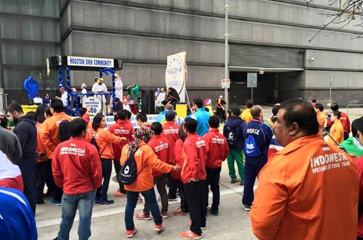 A number of athletes competing at the World Weightlifting Championships took part in the parade