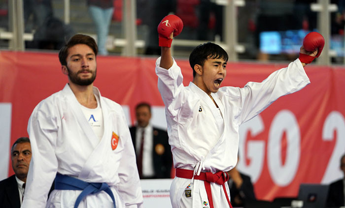 Kazakhstan’s Abilmansur Batyrgali celebrates after earning his country a first gold at the event ©WKF