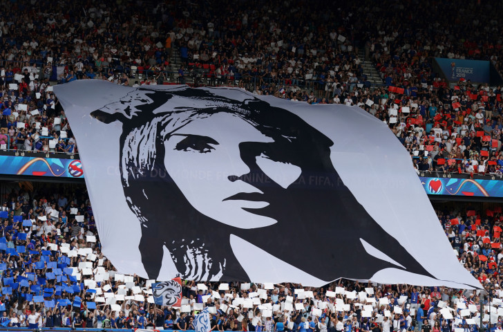 A giant banner bearing a drawing of Marianne, the symbol of the French Republic, is deployed by supporters at this year's FIFA Women's World Cup quarter-final football match between France and America ©Getty Images