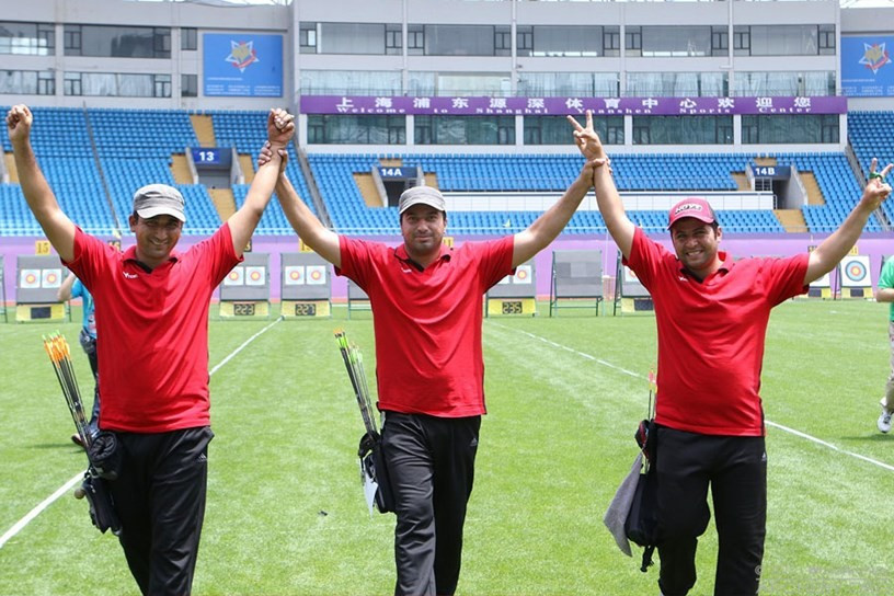 Iran's compound team celebrate reaching the final of the World Cup in Shanghai 