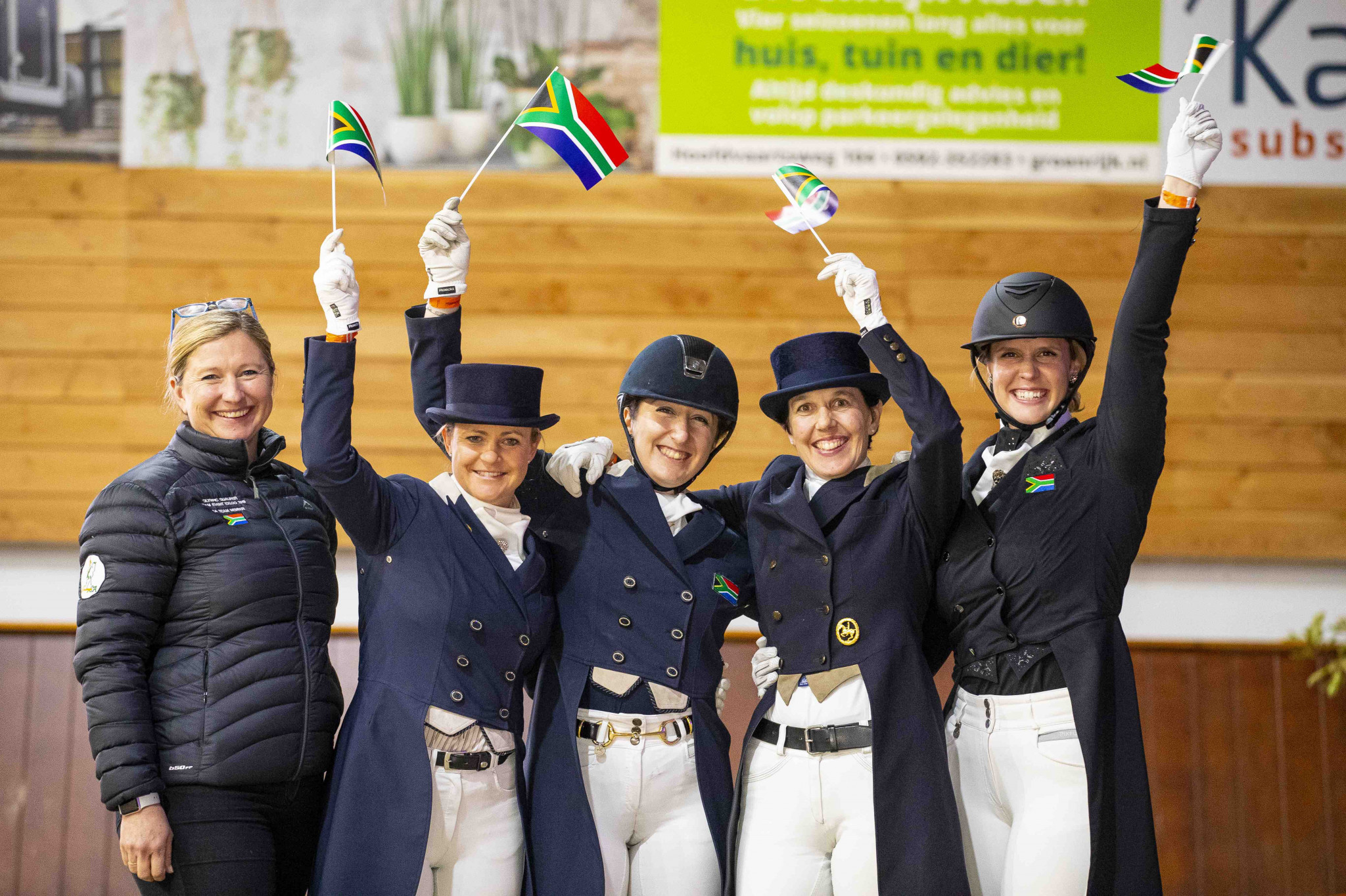 South Africa's dressage squad celebrate qualifying for next year's Olympic Games in Tokyo ©FEI
