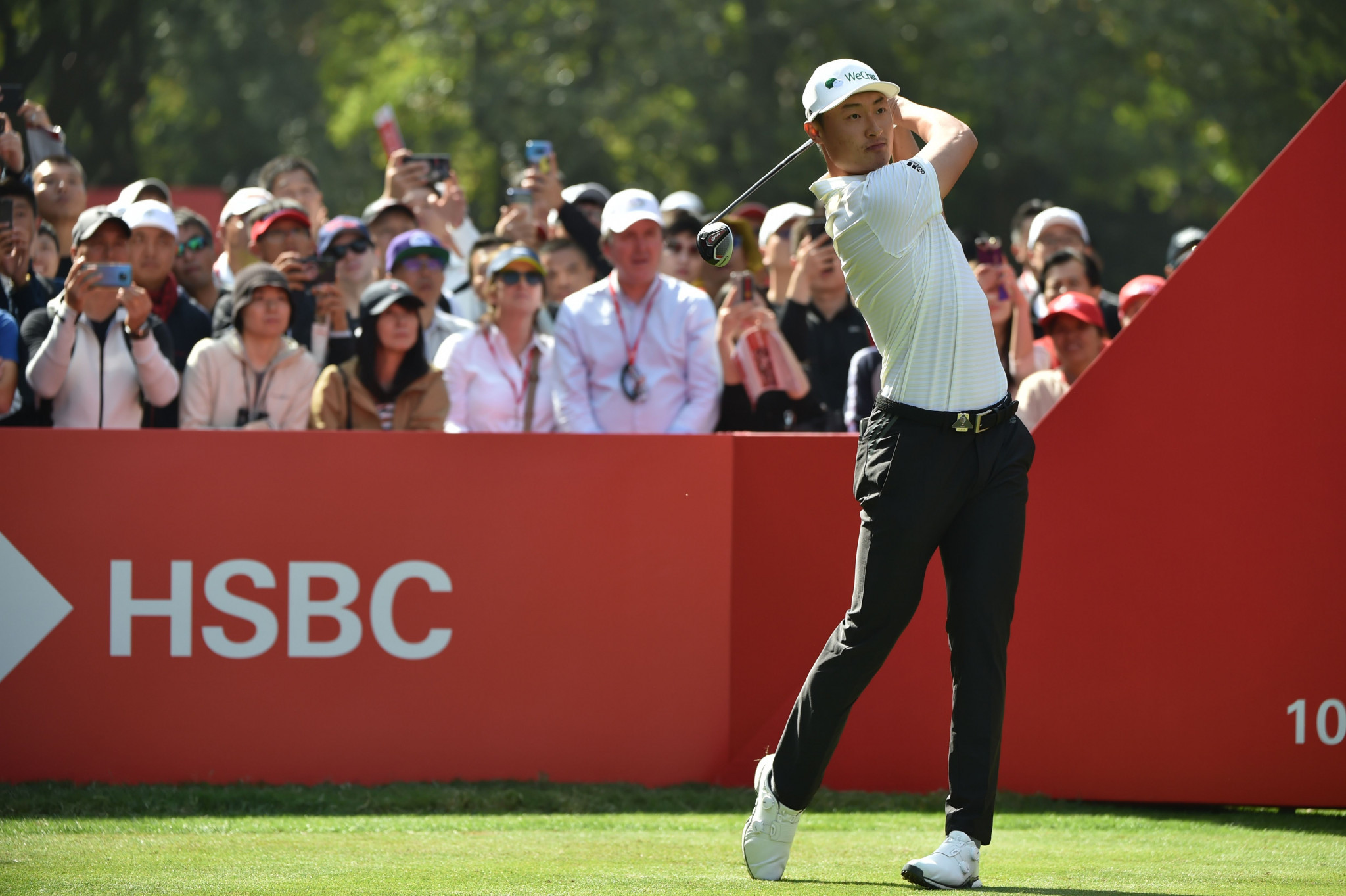 Li on top with McIlroy solid at WGC-HSBC Champions