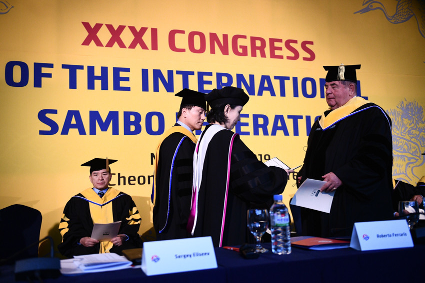 International Sambo Federation President receives his honorary doctorate degree from Yong In University trustees ©FIAS 