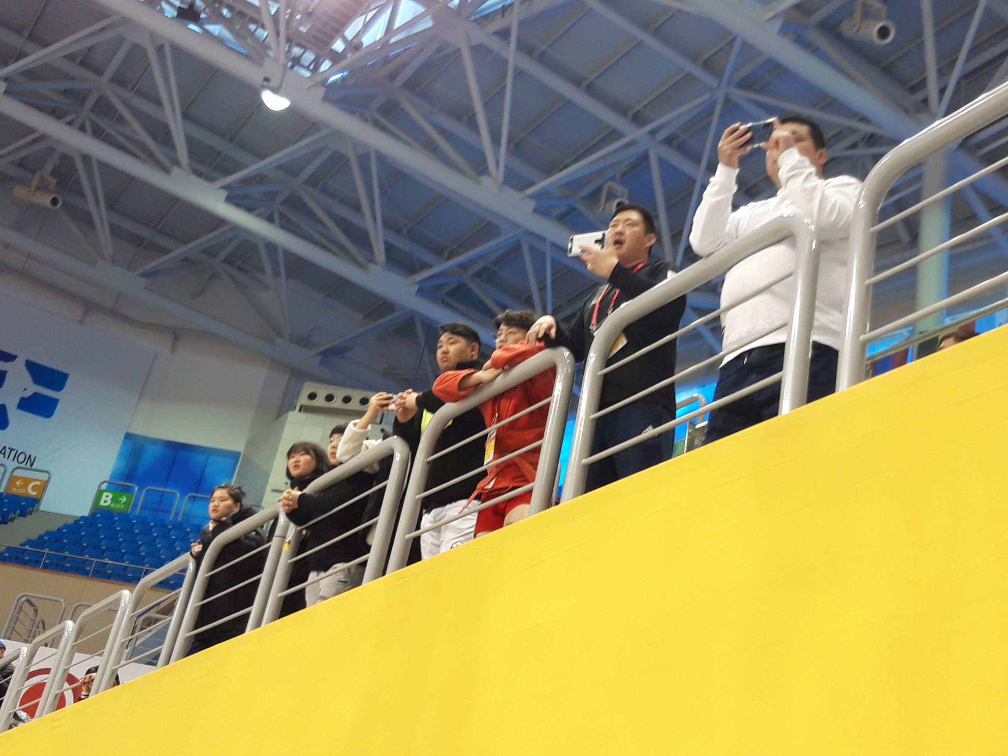 The crowd cheer Jang Jaehee of South Korea to victory in his 74kg preliminary contest against Arnur Kuatay from Kazakhstan ©ITG 