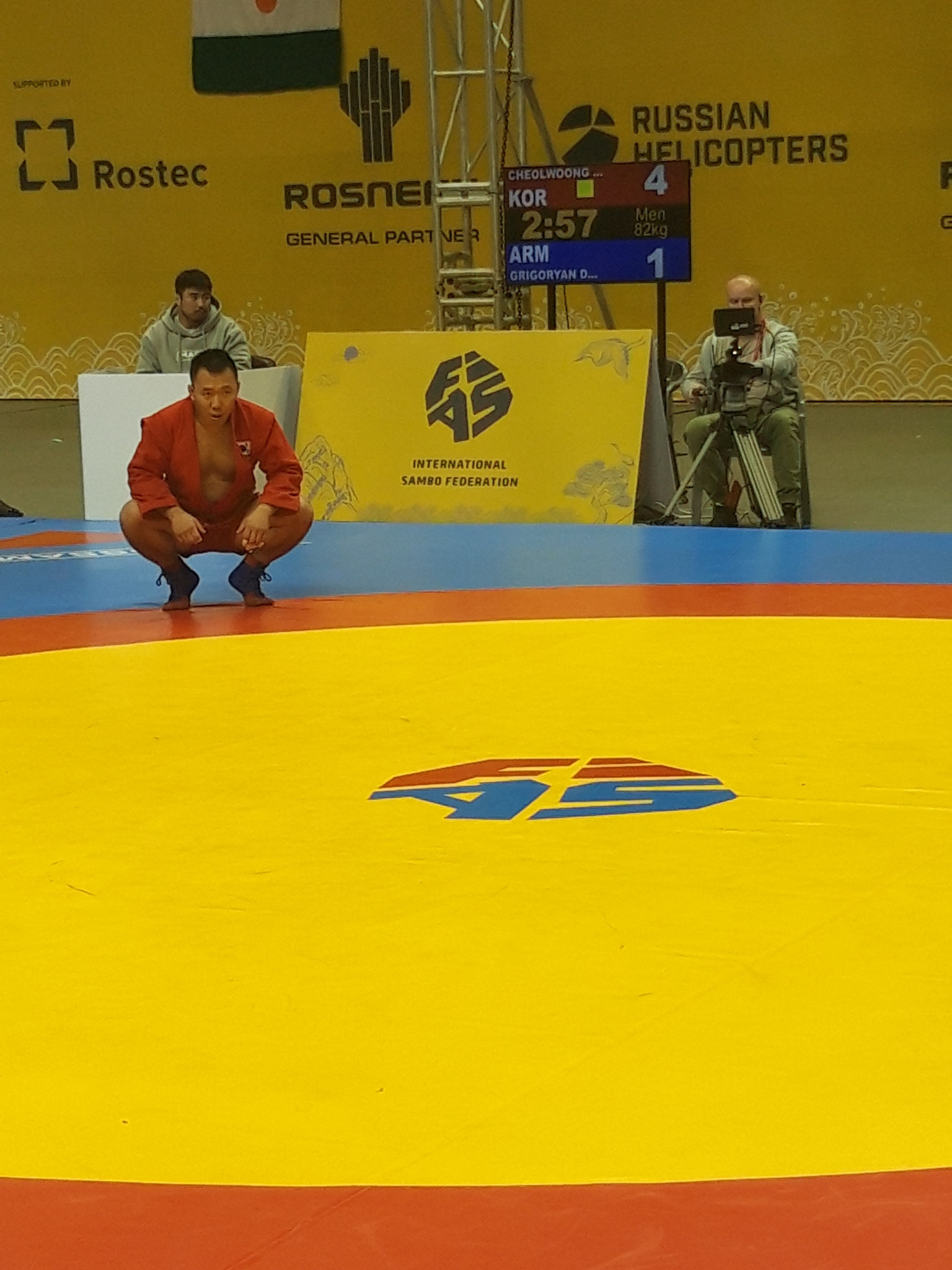 South Korean sambist Cheonwoong An awaits a refereeing call in the men's 82kg preliminary round ©ITG