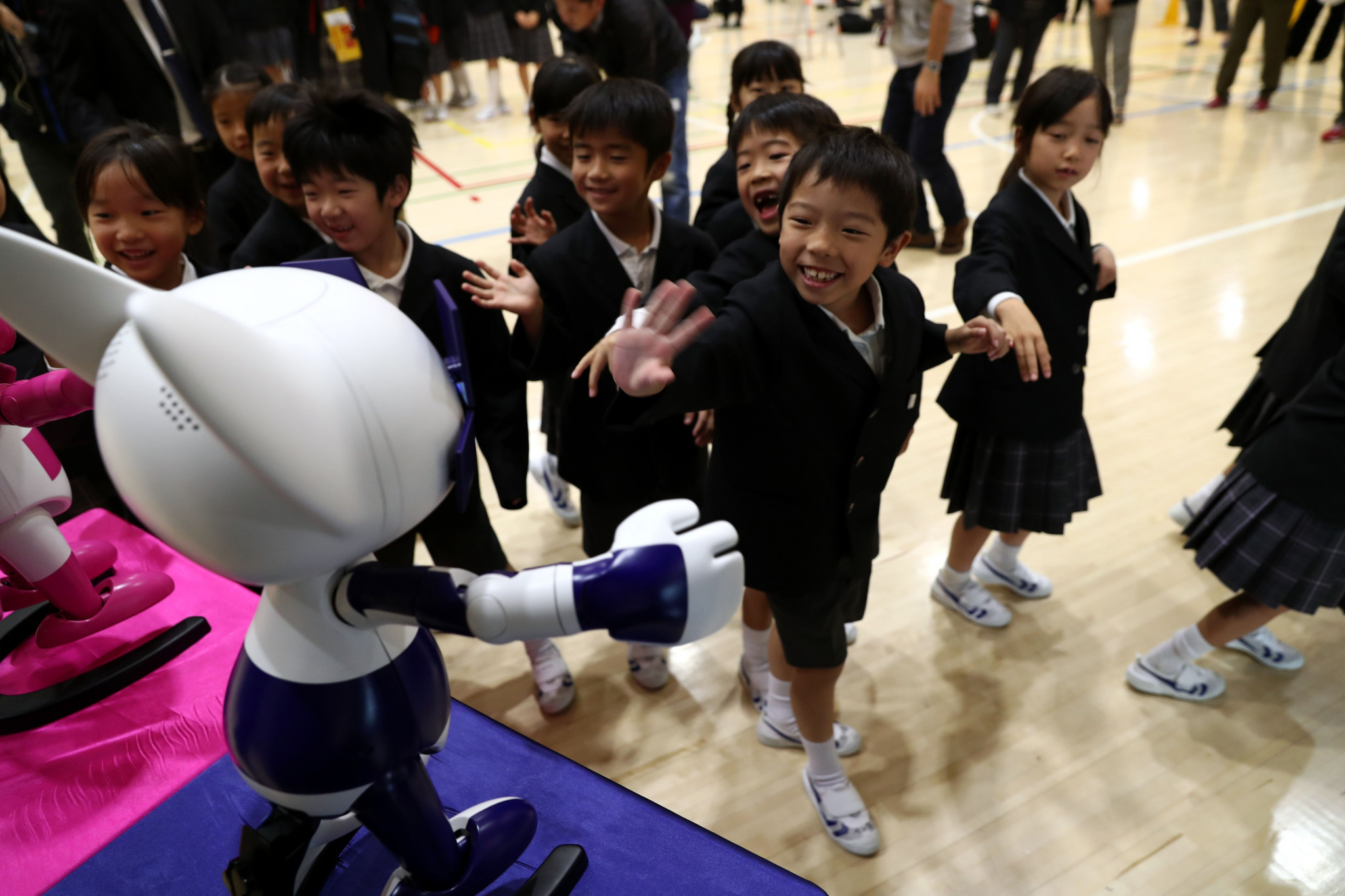 The robots interacted with the children at the school ©Getty Images
