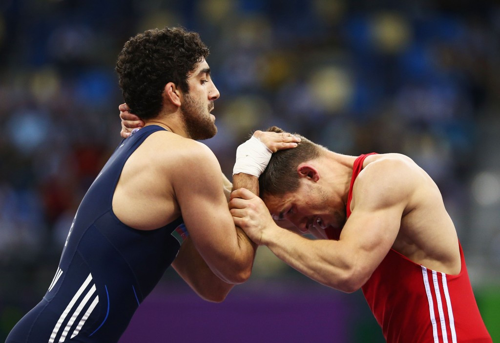 Azerbaijan's Olympic champion Togrul Asgarov suffered a shock loss to the disappointment of the home crowd