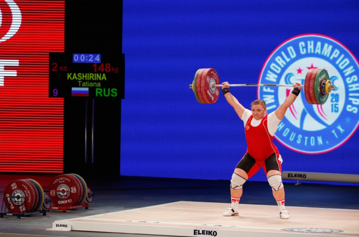 Russia's Tatiana Kashirina successfully defended her three world titles in the women's over 75kg category