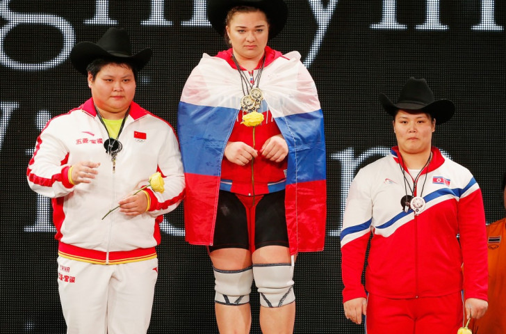 Kashirina stands atop the women's over 75kg overall podium ©Getty Images 