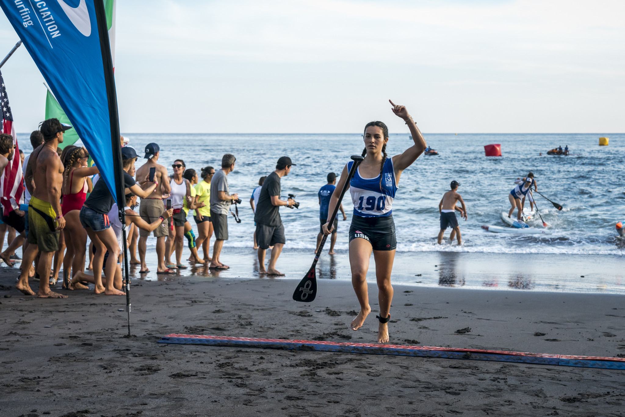Jade Howson from the United States won the standup paddle sprint race to give her team off to a winning start ©ISA 