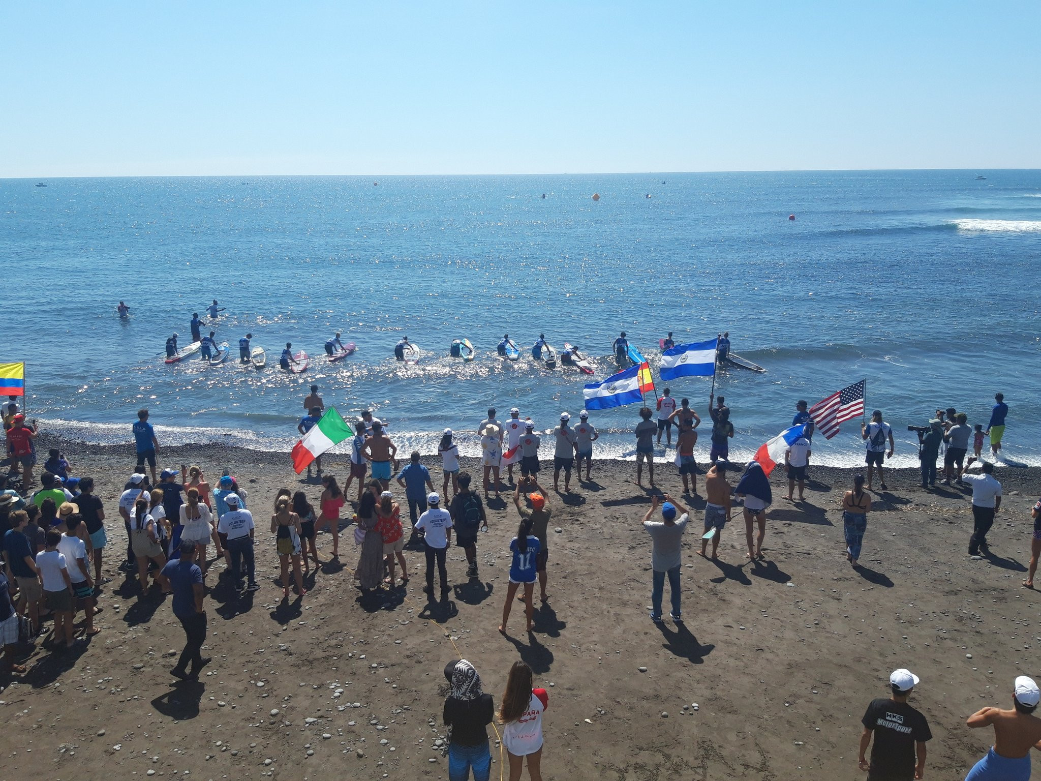 The competitors line up for the start of the men's junior SUP technical race ©ITG