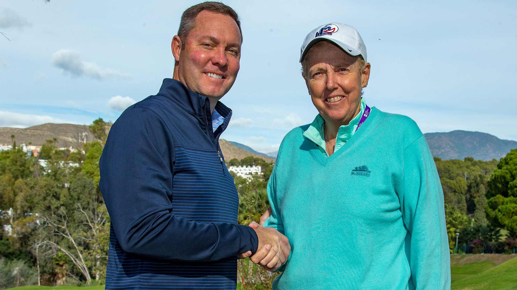 LPGA Commissioner Michael Whan and LET Board chair Marta Figueras-Dotti shake hands on the agreement ©Ladies European Tour