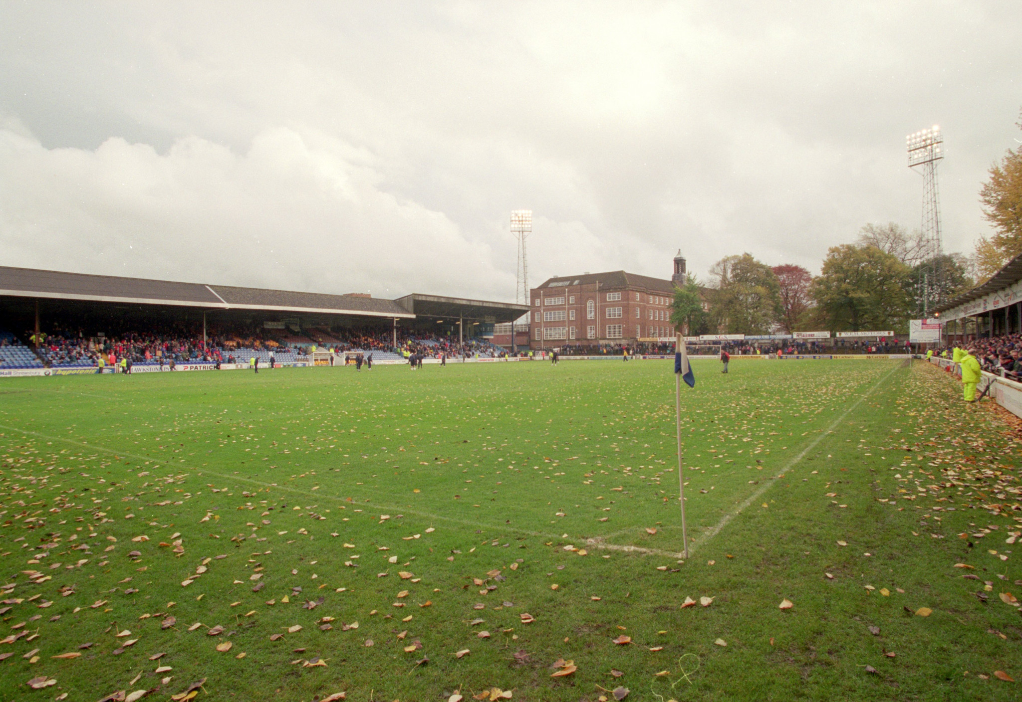 Gay Meadow, old home of Shrewsbury Town, with the River Severn alongside and an old man in a coracle standing by to retrieve footballs booted over the stand ©Getty Images