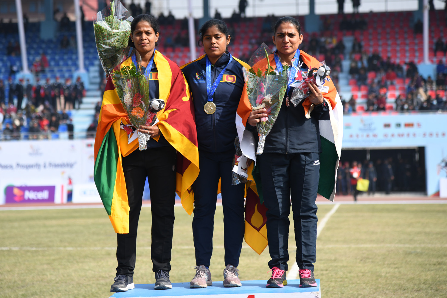 Hurina Kesara Wijayaratne, centre, was one of five Sri Lankan gold medallists on the final day of athletics in Kathmandu ©SAG2019 