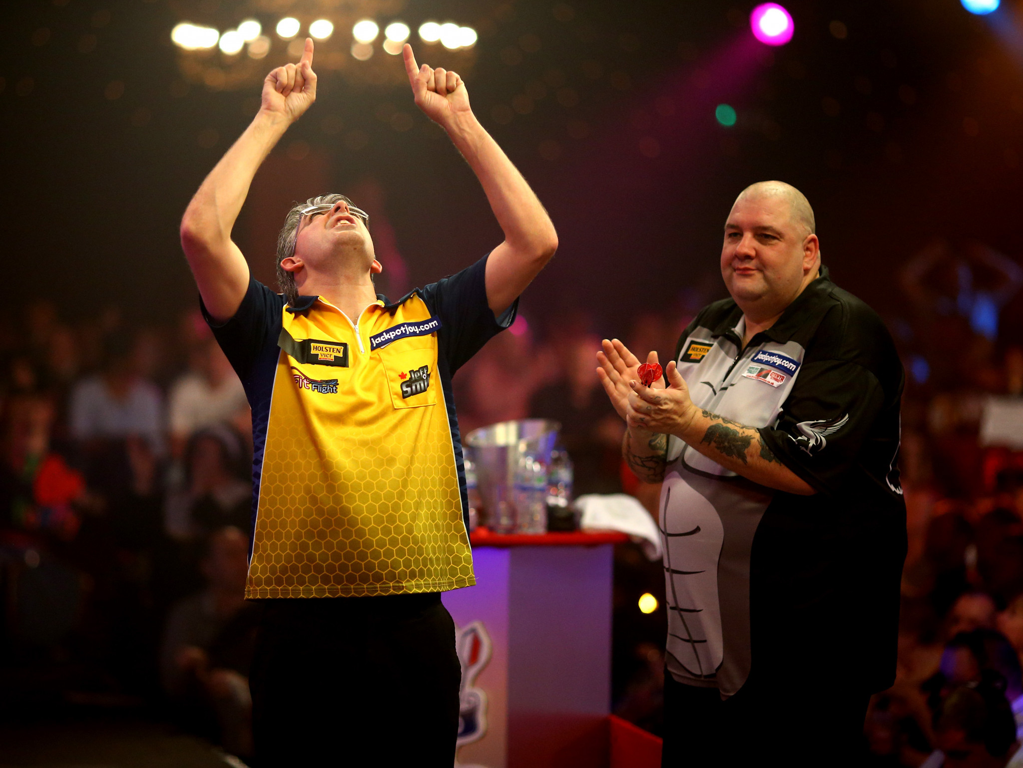 The way it was - Jeff Smith of Canada celebrates winning his quarter final match against Robbie Green of England during the BDO World Championships of 2014 at their old venue of the Lakeside Country Club ©Getty Images

