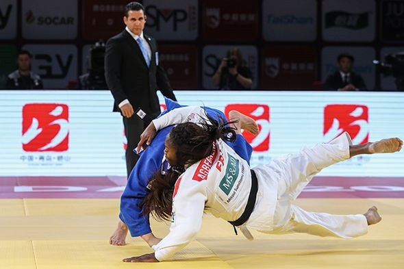 Nami Nabekura of Japan upset world champion Clarisse Agbegnenou in the women's under-63kg final ©IJF