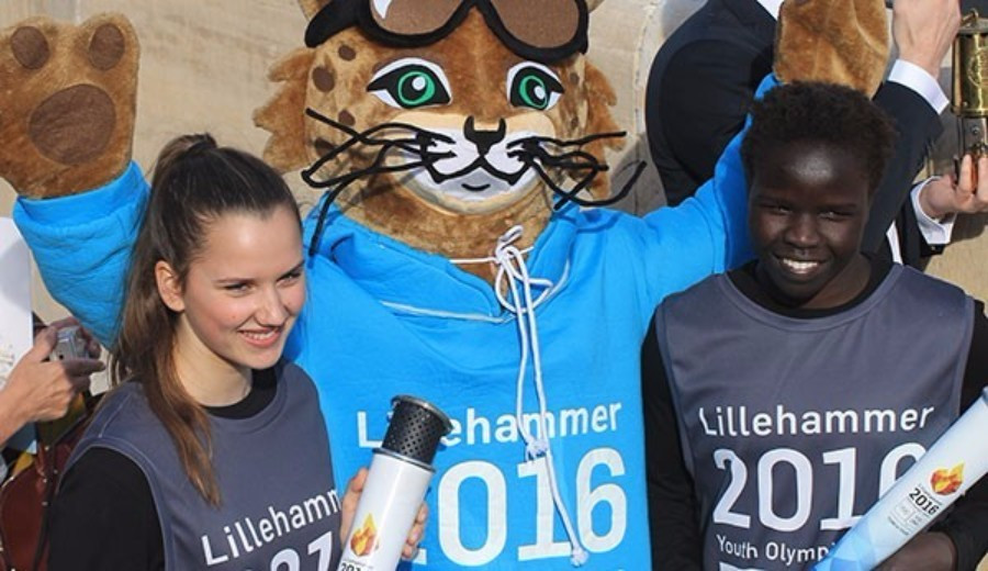 Lillehammer 2016 flame carriers pictured with the Games mascot ©IOC