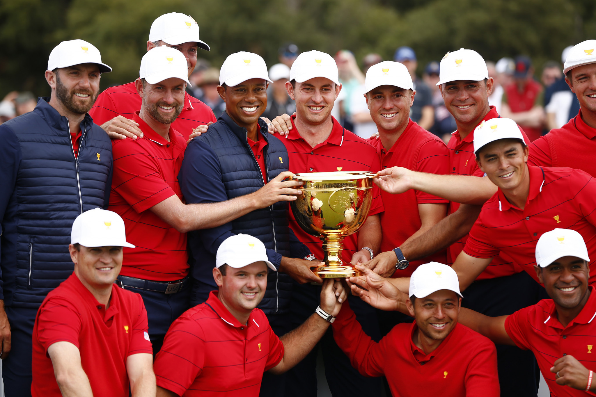 Woods stars as United States fight back to retain Presidents Cup
