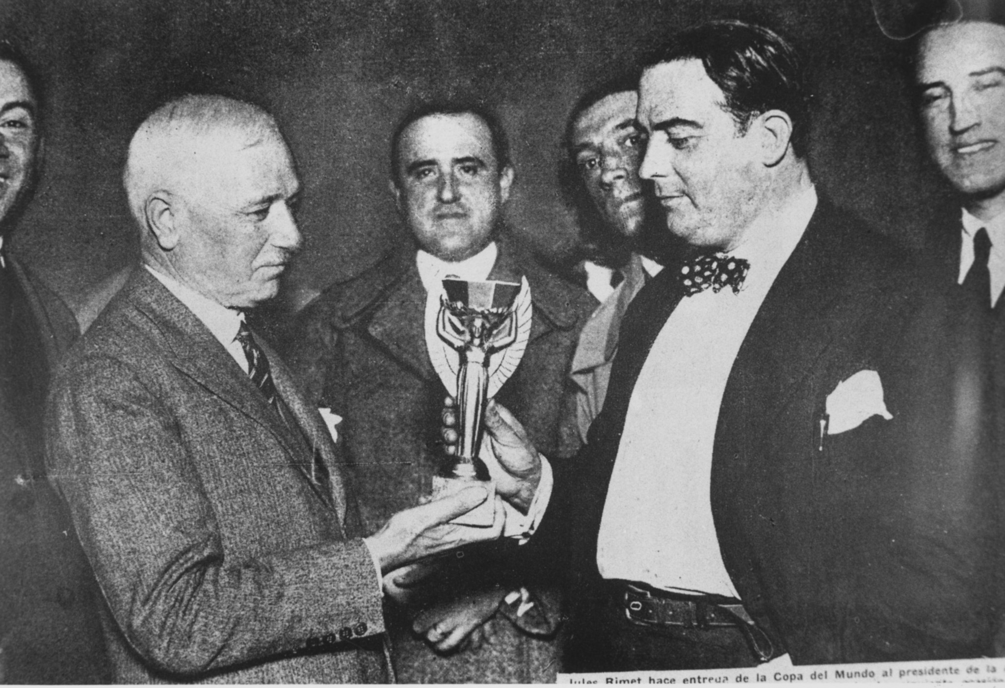 Jules Rimet, FIFA President, presents the 1930 trophy to Dr Paul Jude, the President of the Uruguayan Football Association - a key year in the history of the game ©Getty Images
