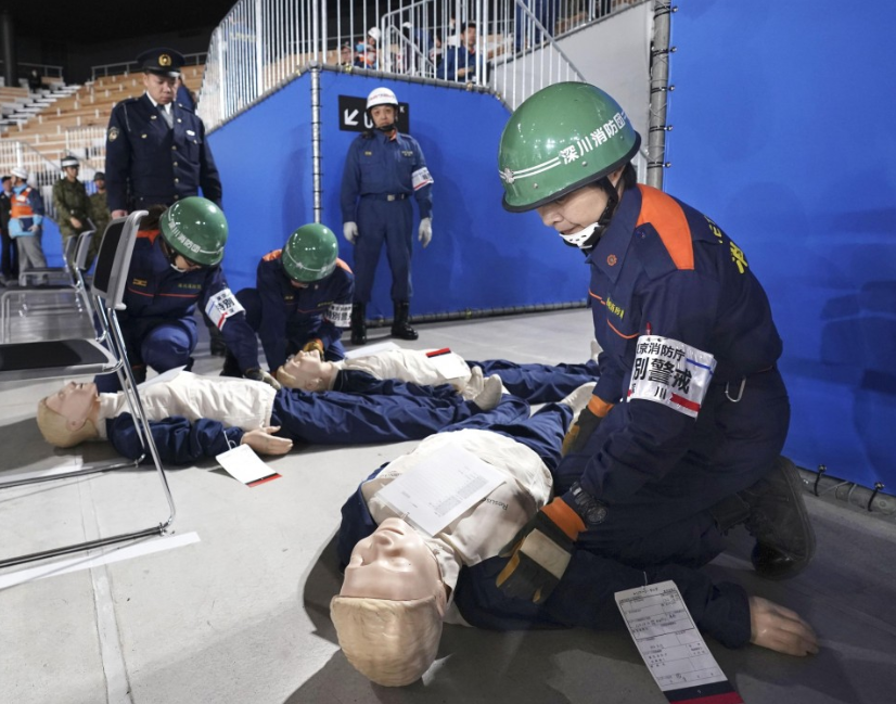 First aid was a crucial aspect of the drill ©Kyodo News