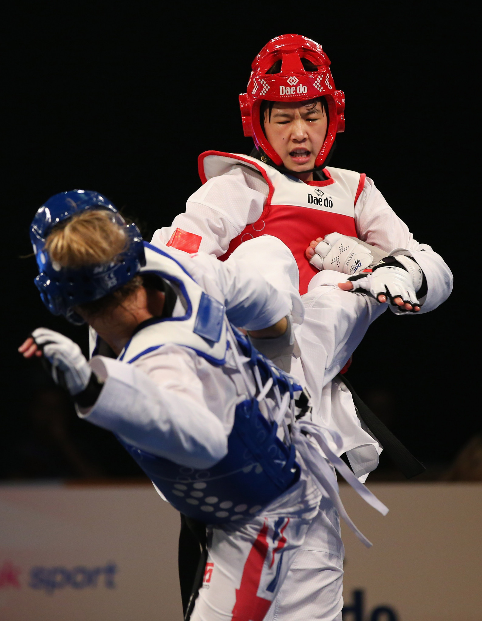 Zhou downs double Olympic champion Jones at World Taekwondo Grand Slam Champions Series 
