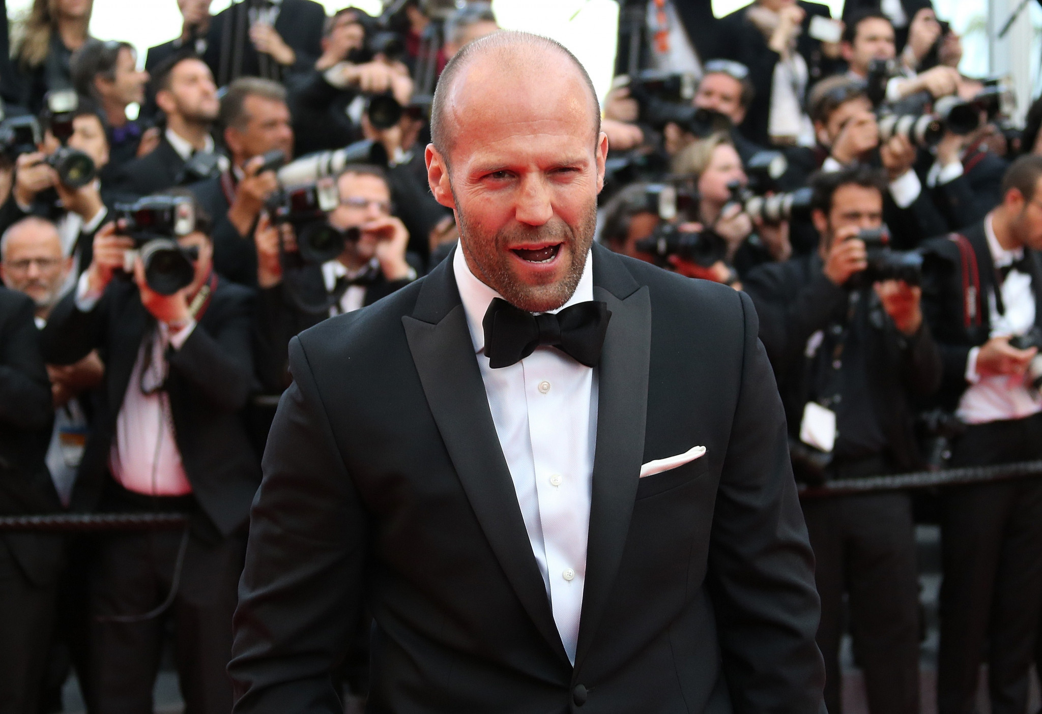 British actor Jason Statham, pictured on the red carpet at the 2014 Cannes Film Festival for the viewing of The Expendables 3, was a member of the British diving team for 12 years before turning to acting ©Getty Images