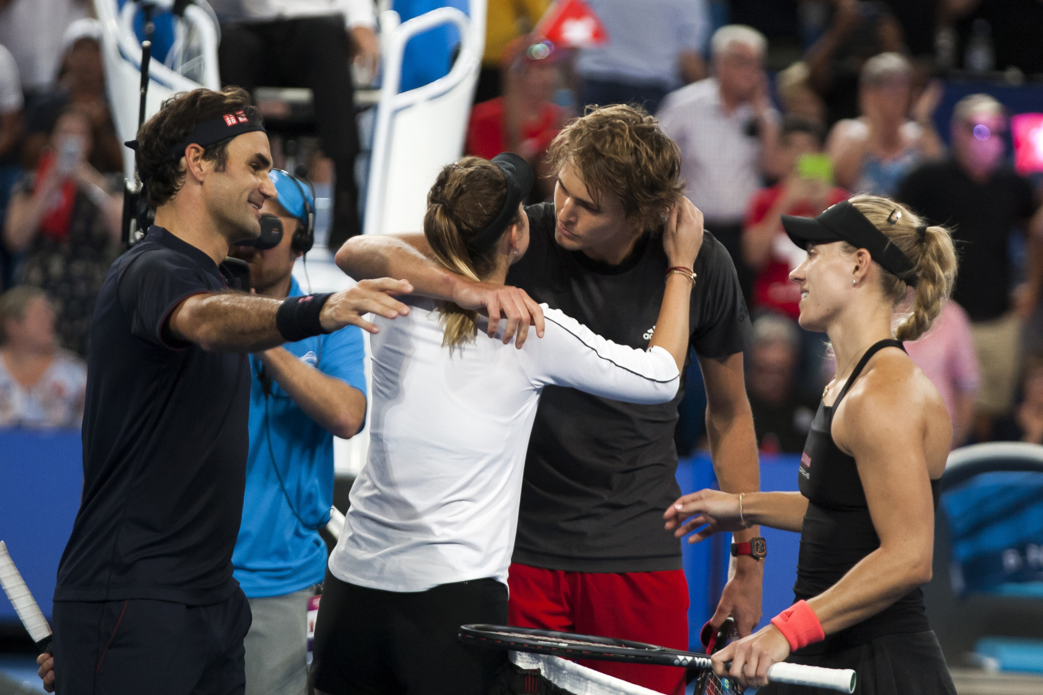Angelique Kerber, right, with Alexander Zverev, second right after playing in the Hopman Cup this year against Roger Federer and Belinda Bencic - a partnership they may renew for Tokyo 2020 ©Getty Images