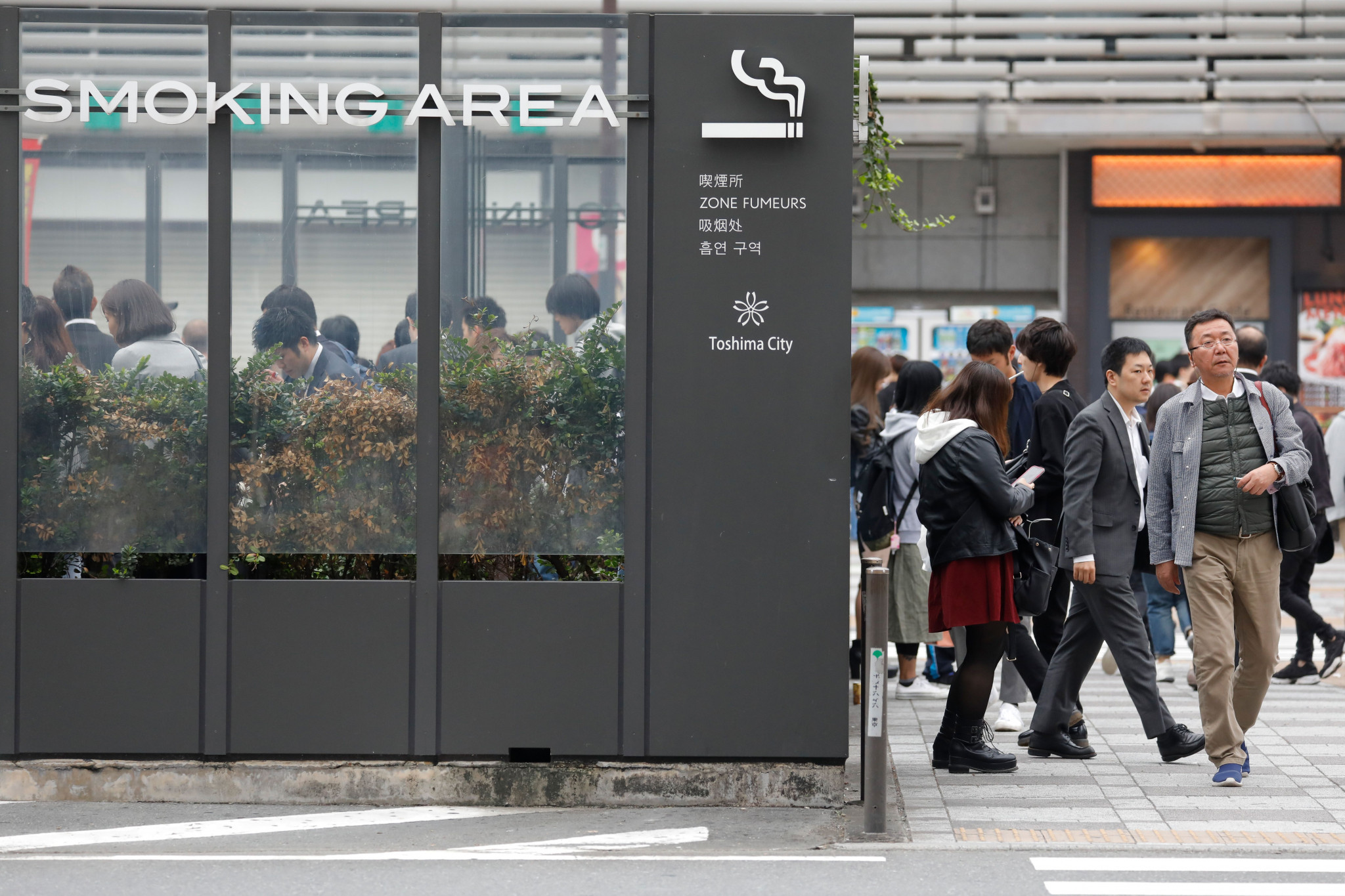 It is still legal to smoke in many public places in Japan, despite the introduction of new legislation ©Getty Images
