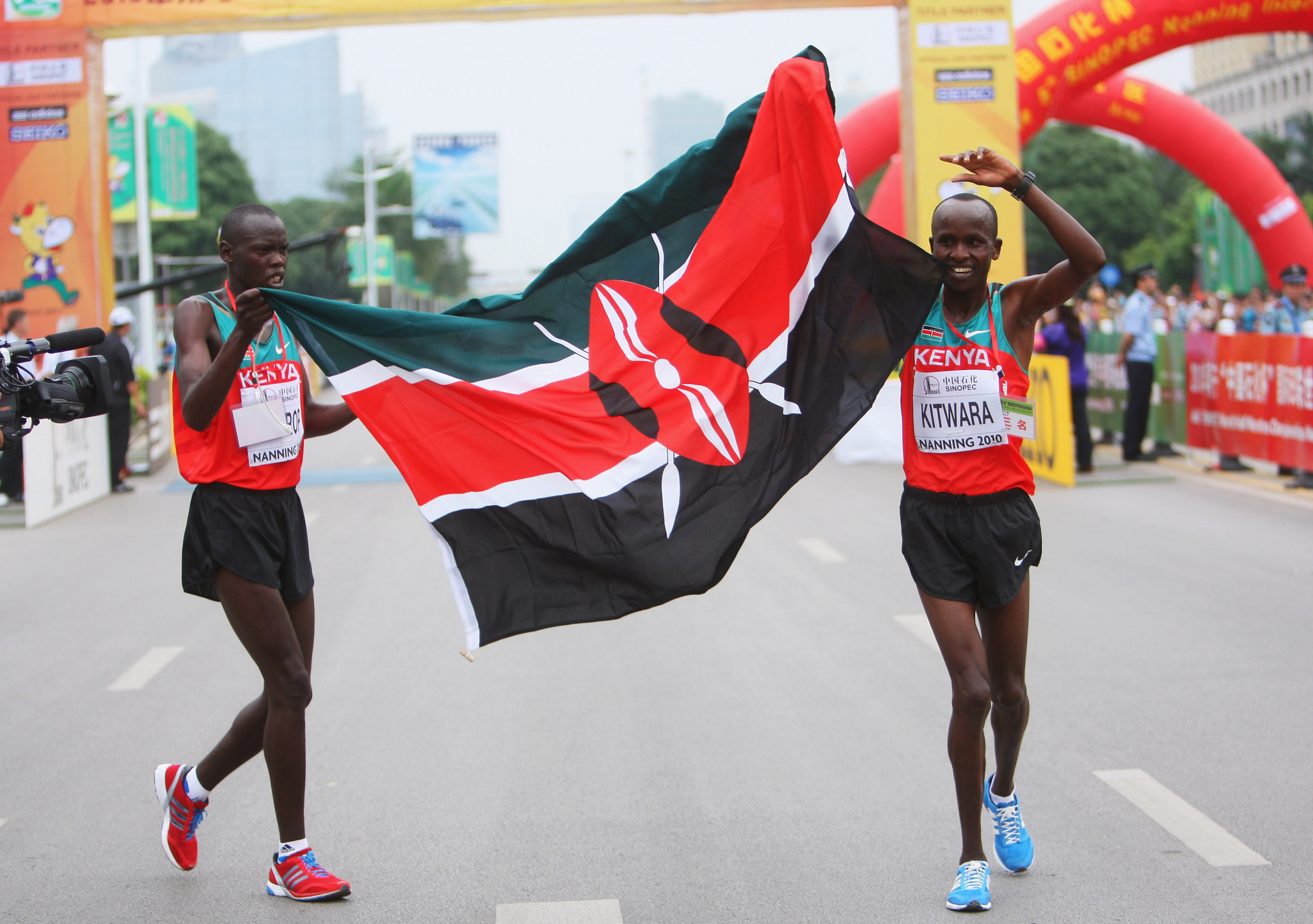 Sammy Kiprop Kitwara celebrates helping Kenya win the gold medal at the 2010 IAAF World Half Marathon Championships in  Nanning, a race in which he also won the individual bronze ©Getty Images