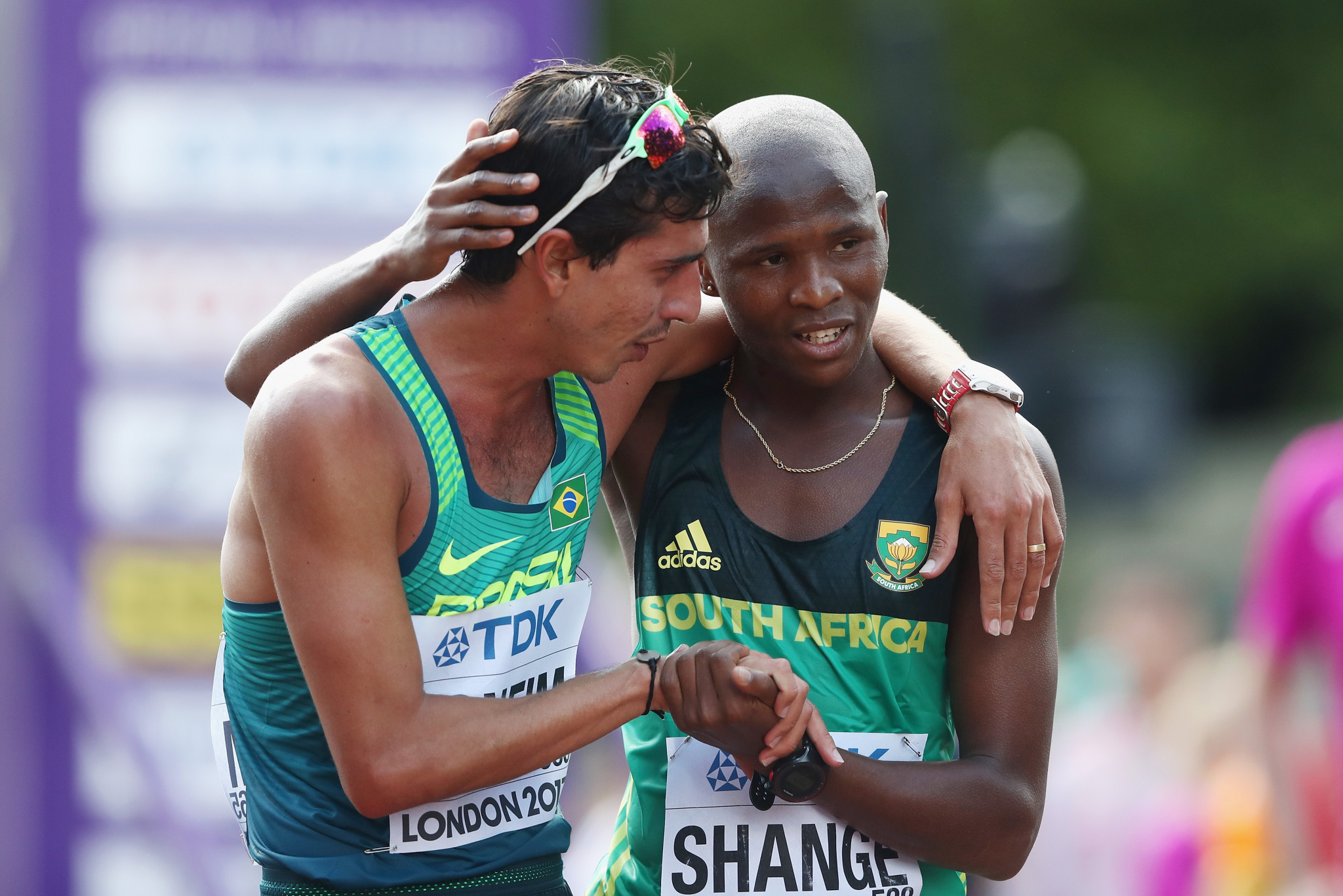 Lebogang Shange is consoled after he narrowly missed a medal at the 2017 IAAF World Championships in London, finishing fourth in the 20km race walk ©Getty Images