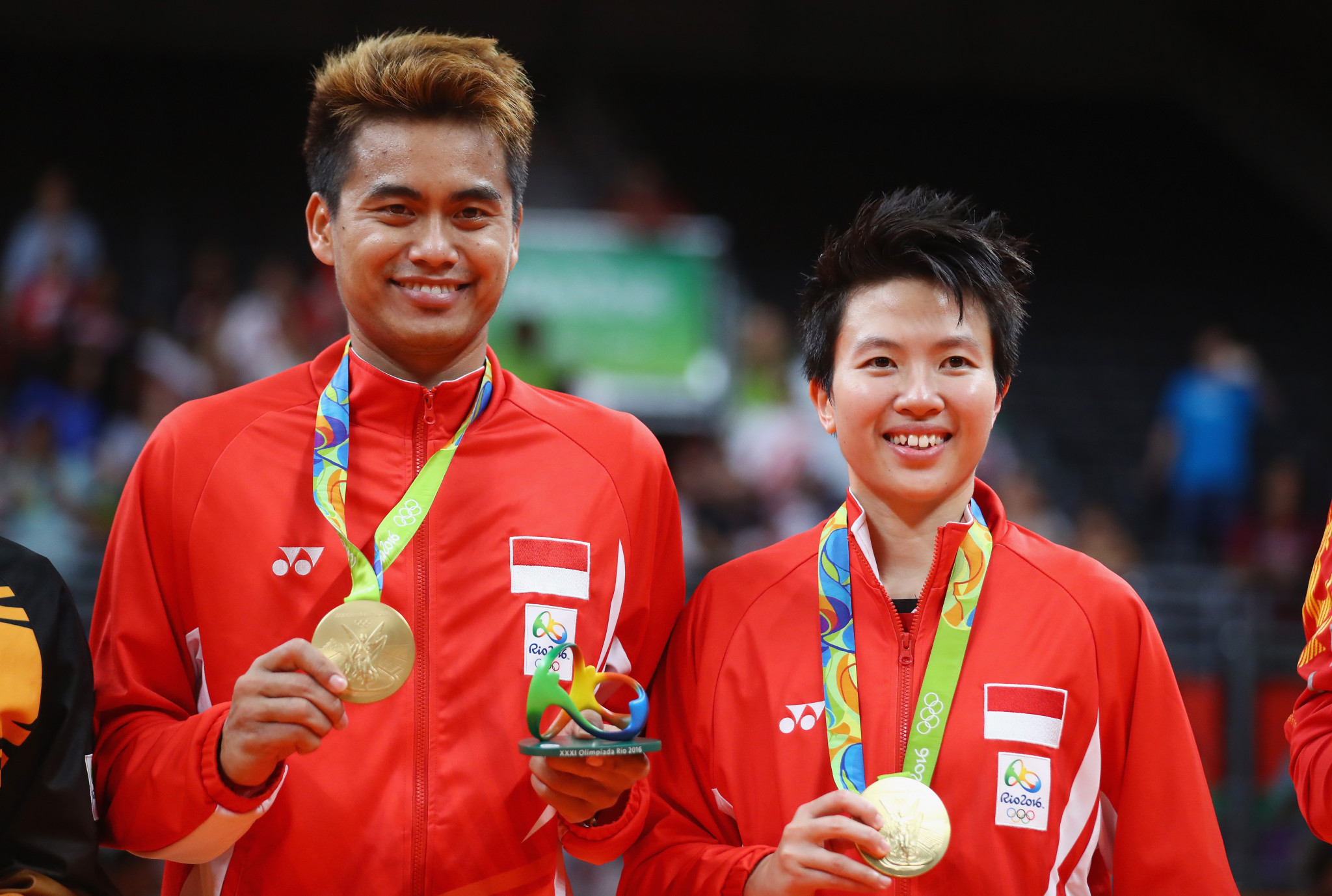 Indonesian badminton players Tontowi Ahmad and Liliyana Natsir celebrate their Olympic gold medals at Rio 2016 ©Getty Images